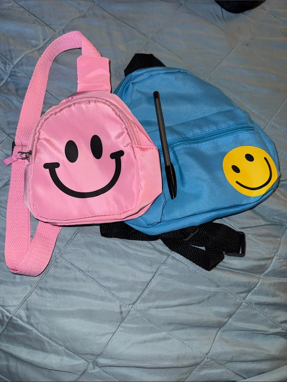 Lot of 2 Smiley Face Mini Sling Backpacks Pink Crossbody Blue Small Travel Bag
